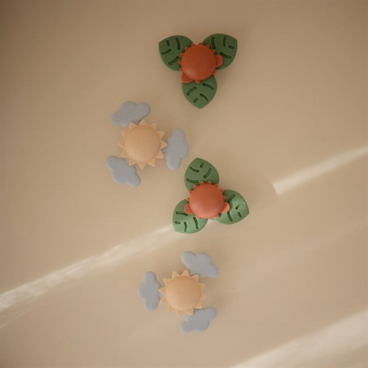 Mushie Dino Suction Spinner Legetøj