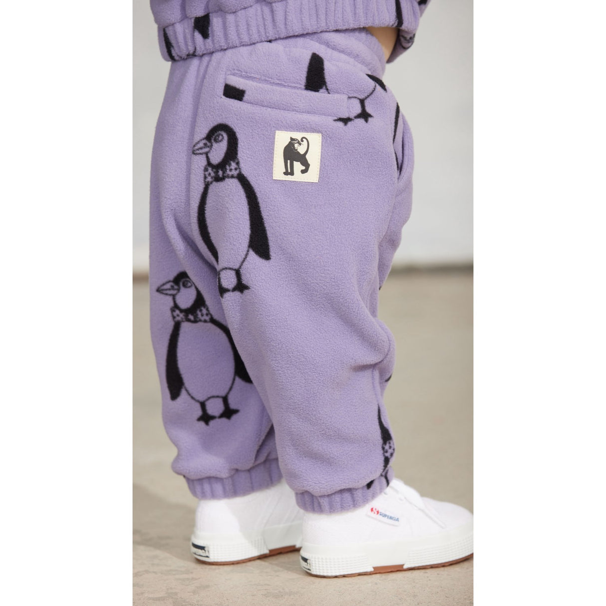 Mini Rodini Purple Penguin AOP Fleece Jakke
