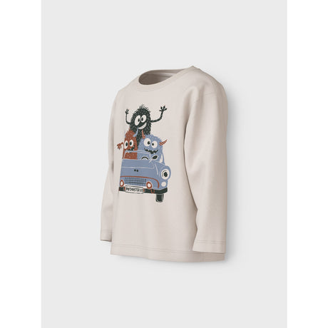 Name It Jet Stream Monsters In Car Vagno Loose Bluse