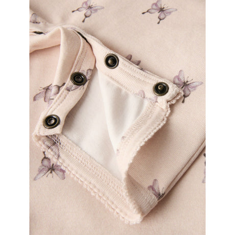 Lil'Atelier Peach Blush Butterfly Gayo Sao Strop Dragt