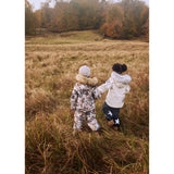 Molo Playing Foxes Polaris Pels Junior Flyverdragt